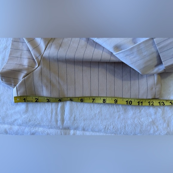 Zara Pleated Skort features a high waist, wrap front, side buckle, pleat details - Picture 12 of 16